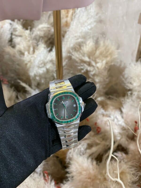 Patek Philippe Nautilus 40.5mm 5711/113P-001 Platinum With Emerald Baguette Bezel - Image 2